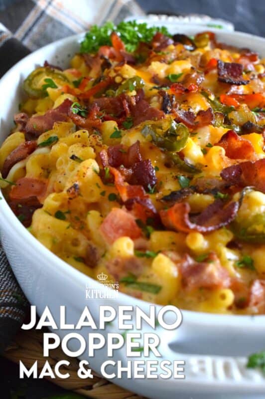 Macaroni and Cheese is always good even when it's bad, but you haven't tasted good until you've feasted on this Jalapeno Popper Mac and Cheese!  Not only is it the cheesiest and creamiest, but it's also loaded with jalapenos, crispy bacon, fresh green onions, and chopped tomatoes too! #macandcheese #macaroni #cheese #jalapeno #jalapenopopper